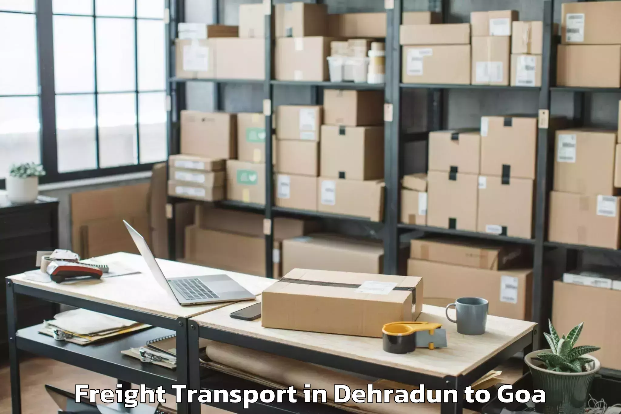 Affordable Dehradun to Mopa Freight Transport